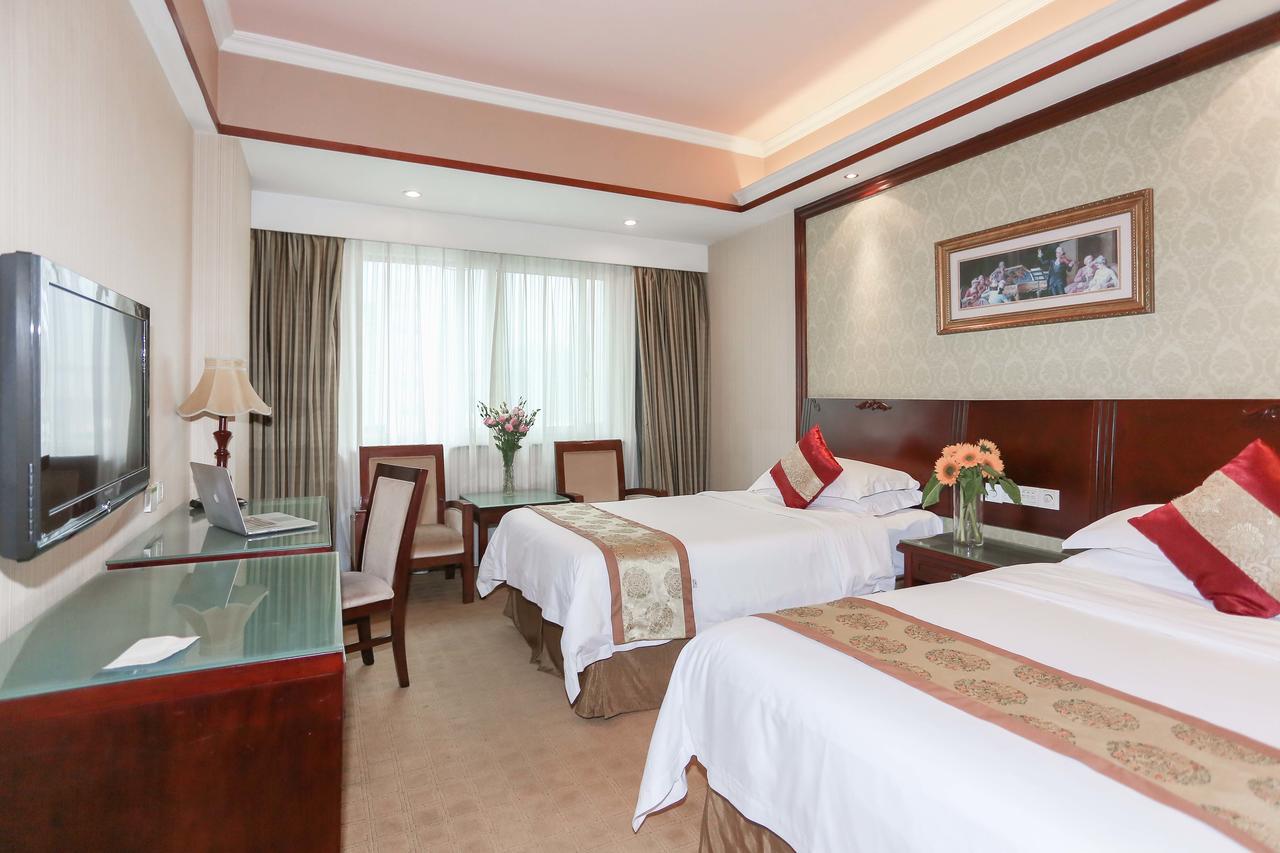 Vienna Hotel Shenzhen Shuanglong Subway Station Exterior photo