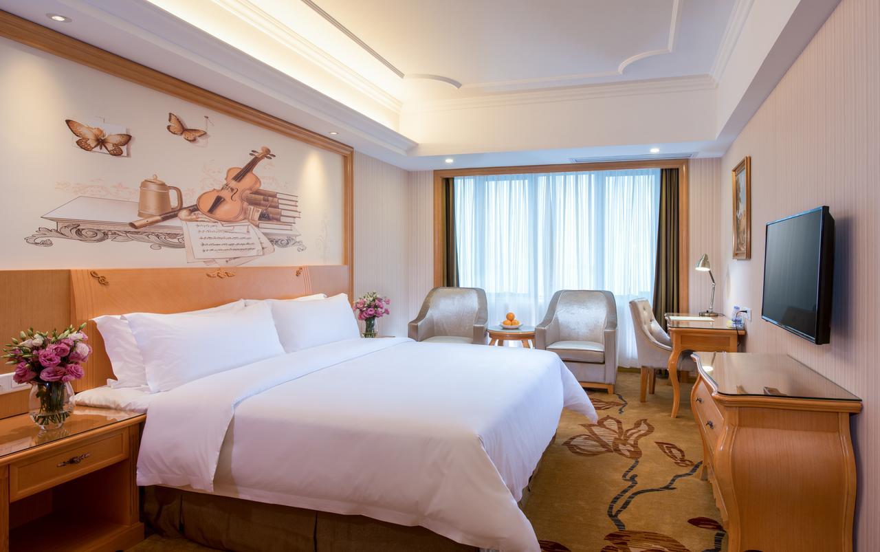 Vienna Hotel Shenzhen Shuanglong Subway Station Exterior photo